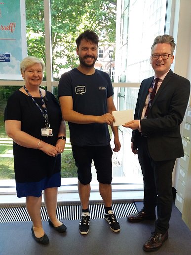 LJMUlibrary's tweet photo. Congratulations to Philip Newton from Student Advice and Wellbeing the first winner of the #LJMUTLC18 Library Challenge, who was presented with a £25 Amazon voucher by Val Stevenson, Head of Academic Services and Andrew Barker, Associate Director. @LJMUsaw https://t.co/grMwbxq2Qx