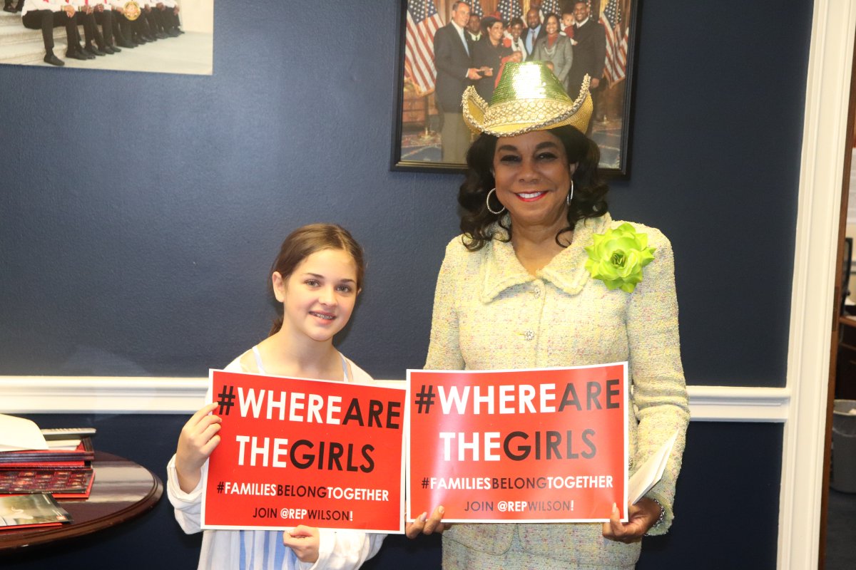 RepWilson's tweet photo. It was so uplifting to meet my young constituent Zoe, age 12, who traveled to Washington to participate in a #FamiliesBelongTogether rally across from the White House. Children around the nation are paying attention to @realDonaldTrump's inhumane policies and asking, "Why?" https://t.co/vkvkfbXAGQ
