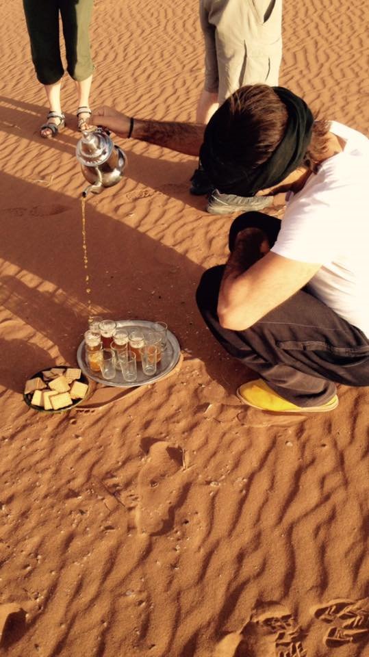 magical_morocco's tweet photo. Anyone in for some delicious Moroccan tea? During a hiking-trip break Hassan serves tea to everyone. Bsaha! #cheers #hike #hiking #break #tea #teatime #morocco #travel #wandelrust https://t.co/W4VD8XaGLU