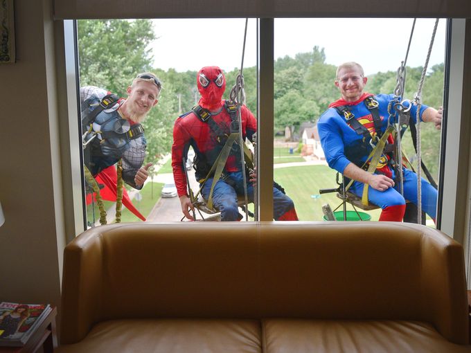Argus911's tweet photo. Photos: Superheroes assembled at @SanfordHealth to clean windows and put a smile on kids' faces. More: https://t.co/xSGKh3Bhpz https://t.co/XOWRACzv6U