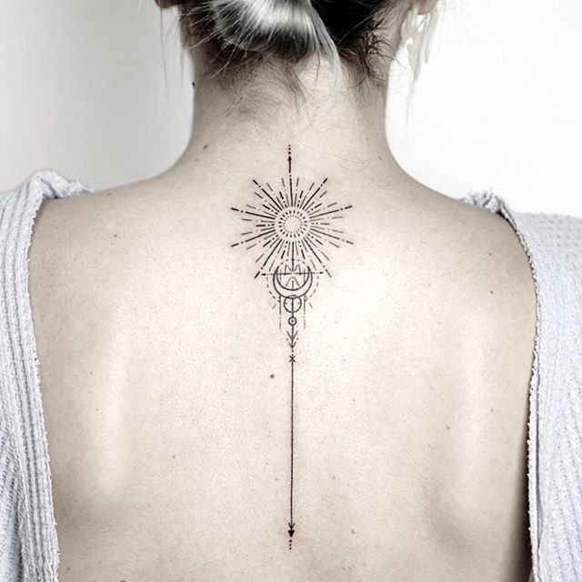 FIne line ornamental moon and star tattoo on the neck