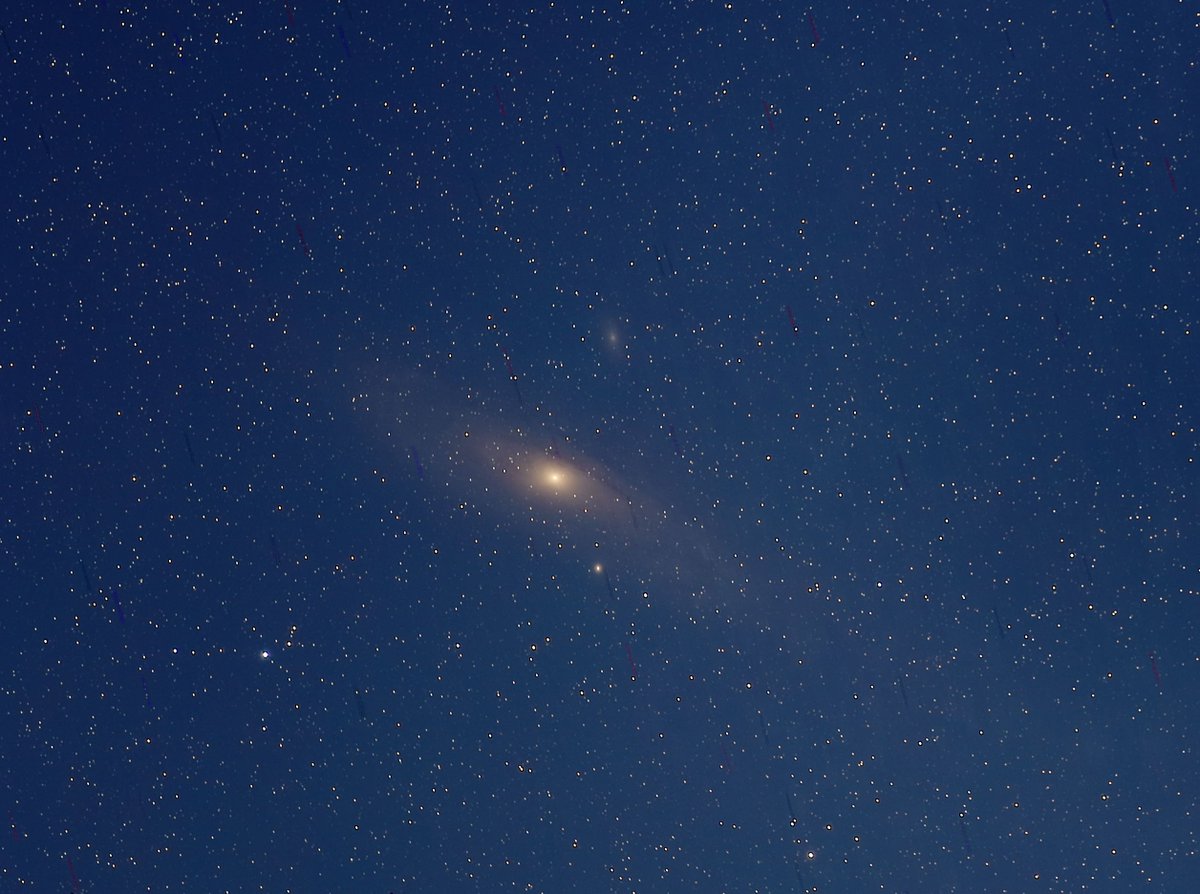 merinrejichacko's tweet image. M31, the Andromeda Galaxy, taken with a Canon EOS D9, 200 mm lens, 31 exposures with 45 s each, ISO 800, F4.5. The first is the original stacked image thanks to #DeepSkyStacker, and the second is after #Photoshop. Not bad for a first try, if I say so myself.