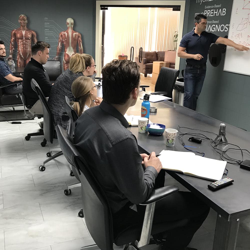 NoraxonUSA's tweet photo. Here'sSeth, one of our mechanical engineers, training the junior team members on the importance of the calibration pose for IMU data collection. Haven't tied 3D motion into your workflow yet? Check out your possibilities here: https://t.co/1ZWtORR0Pd #MovementDataPeople https://t.co/Jhic2s3dAy