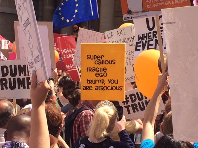 _jdavenport's tweet image. There are some great banners on the Trump protest march today, courtesy of our reporter on the spot John Dunne