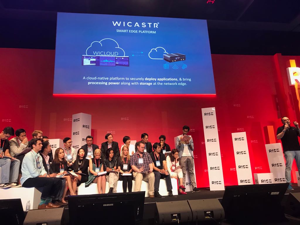 On stage, <a href="/WiCastr/">WICASTR</a>, the smart edge platform, a cloud-native platform to securely deploy applications &amp; bring processing power along w/ storage at the network edge, semi-finals for <a href="/RISEConfHQ/">RISE</a> Pitch. #RISE2018