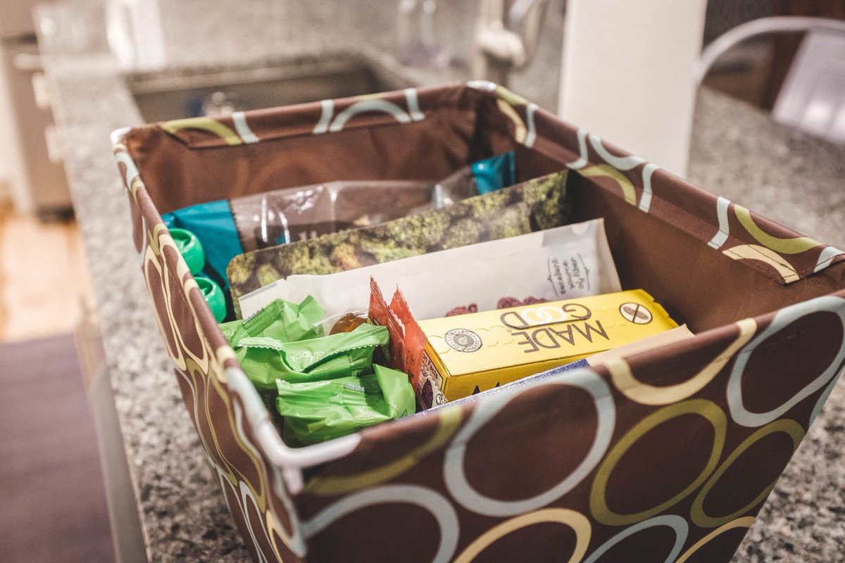 Here's a peek at an "emergency snack box" we recently stocked for Ollie. This stays at daycare and can supplement his food on days he runs out (which happened at 10:30 AM once recently 😳) and also has a few treats!