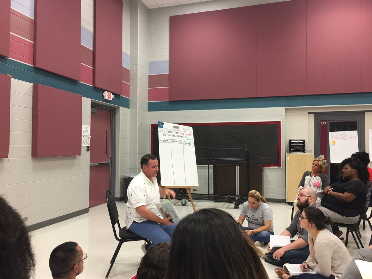 DrAngelesPerez's tweet photo. Gathered around to engage in writer's workshop - thanks @TrentTDeBerry for really engaging the teachers @SpringISD ! #TCRWP https://t.co/sULpFIWIQL