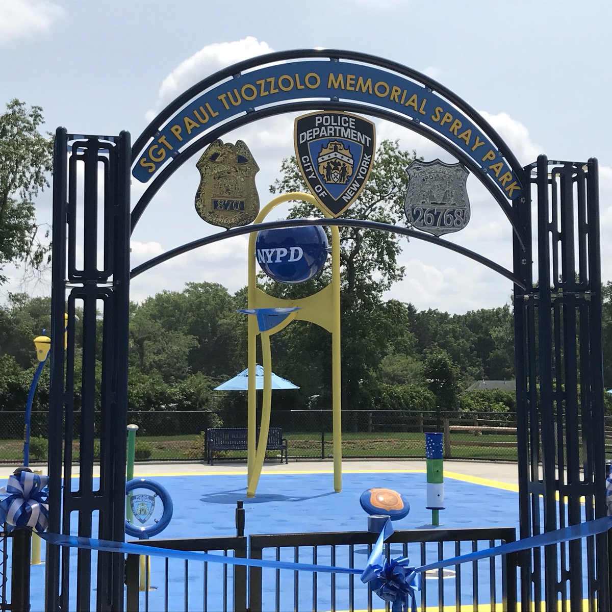 NYPDChiefPatrol's tweet photo. Huntington, Long Island, resident and @NYPD43Pct Sergeant Paul Tuozzolo was killed in the line of duty in Nov. 2016 in the #Bronx. Today his hometown dedicated a spray park in his name.

#neverforget https://t.co/Z2CmDw4t5E