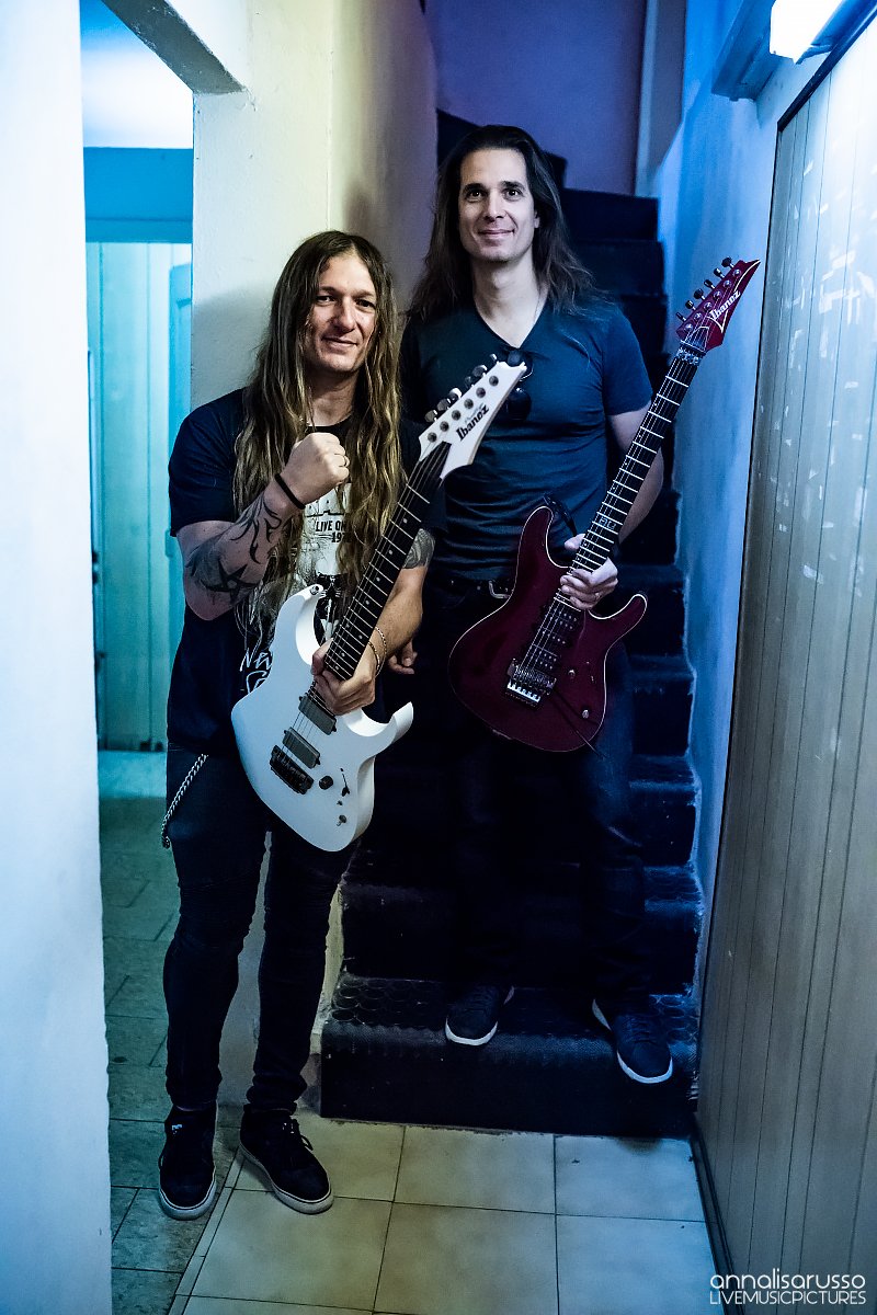 Axemen! The amazing <a href="/KikoLoureiro/">Kiko Loureiro</a> from <a href="/Megadeth/">Megadeth</a> and me with our <a href="/ibanezofficial/">Ibanez Guitars</a> Guitars.The very 1st european tour we did together was back in 2007!Crazy time and the friendship is strong!Backstage photo taken during MMI INTERNATIONAL SUMMER CAMP 2018! <a href="/DaddarioandCo/">D'Addario</a> @ZoomSound