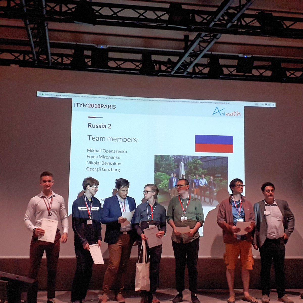 ITYM2018's tweet photo. Pascal Auscher, Director of @INSMI_CNRS, gives the Second Prize of #ITYM2018 to the team Russia 2. https://t.co/ZqZELiwkrp