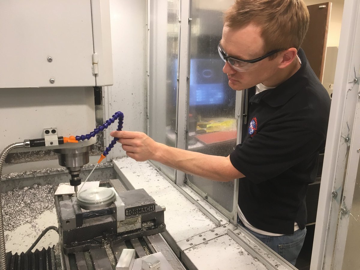 John Shepard of Yolo Robotics making a drive wheel for his robotic mushroom harvester using the CNC mill at inventopia.