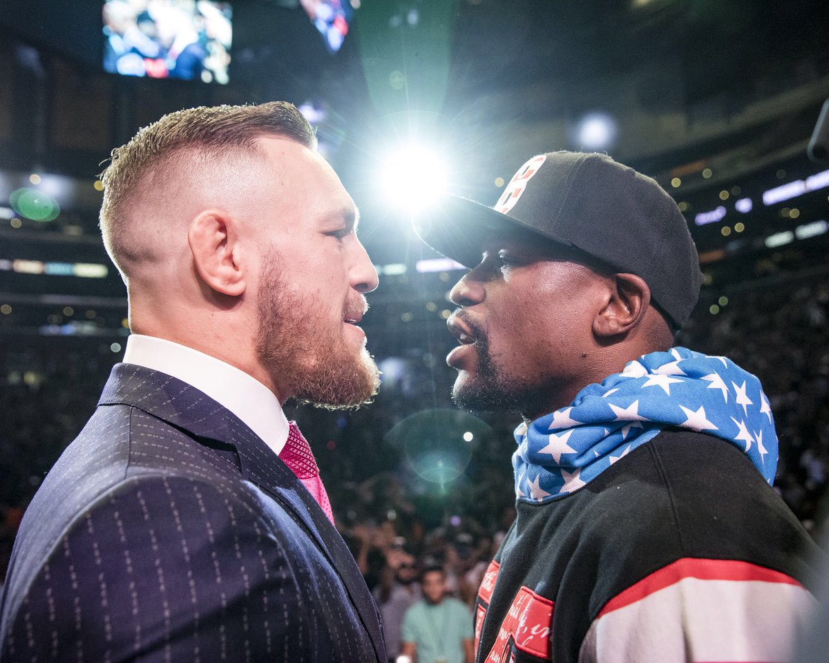 Swanson_Comm's tweet photo. @FloydMayweather & @TheNotoriousMMA came face-to-face for the first time in front of a packed house of fans and media at the STAPLES Center in Los Angeles #MayMacThrowback 📸 @allelbows https://t.co/2SLvXpFfiB