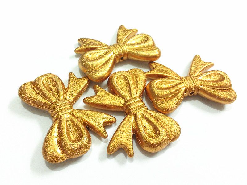 Shimmer Gold Bows 46*36mm size.