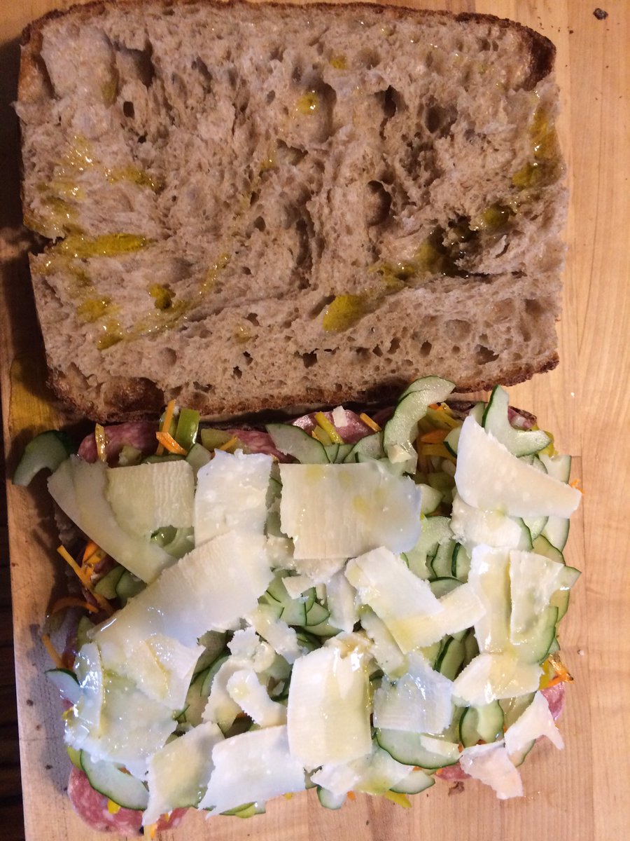 sunstreetbreads's tweet image. It's @NokomisMarket night! So many good veggies, berries and foods, and our baker Jon is plying his delicious wares. If you go, you too could make a giant sandwich like this for dinner!