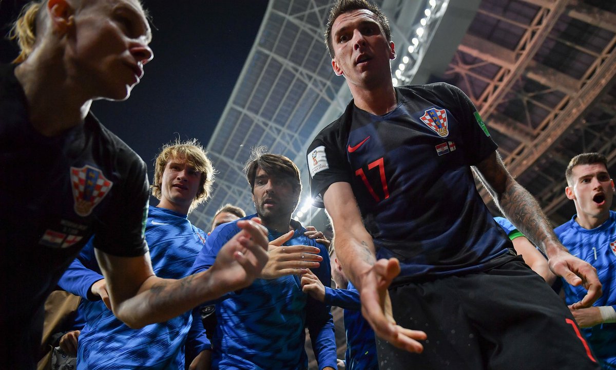 markhood's tweet photo. Two of the photos from the photographer squashed by the Croatian team’s celebrations! (Via https://t.co/OTBk2oYeOD ) https://t.co/Etq3HoqtWS