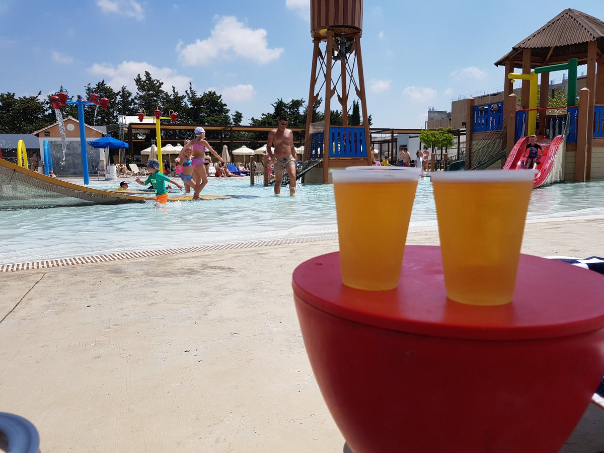 neilweightman's tweet image. New holiday all inclusive rule.  No drinking beer till 12 noon.  Cocktails and Gin is fine, but no beer.  Unless really parched.  He says at 11.11am drinking from two beer cups. #RocknRoll excess at the #KidsPool #Cyprus