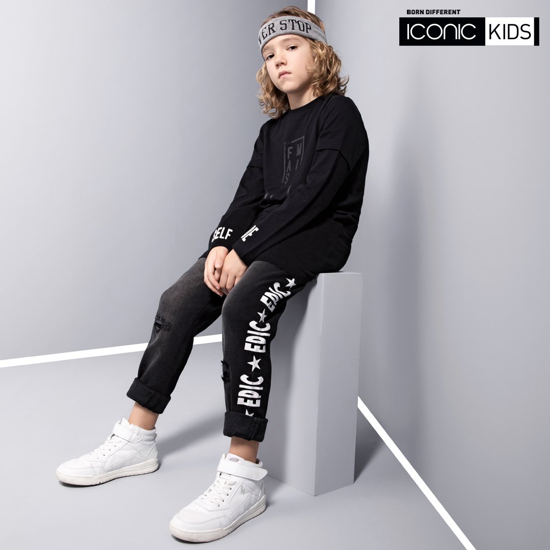 Serving street-style vibe! .
 Shop the new collection in stores now! 
دائماً يفضل الولد أن يعبر عن شخصيته بملابسه 

  #Summer #IconicME #Fashion #Style #IconicKids #black #kids