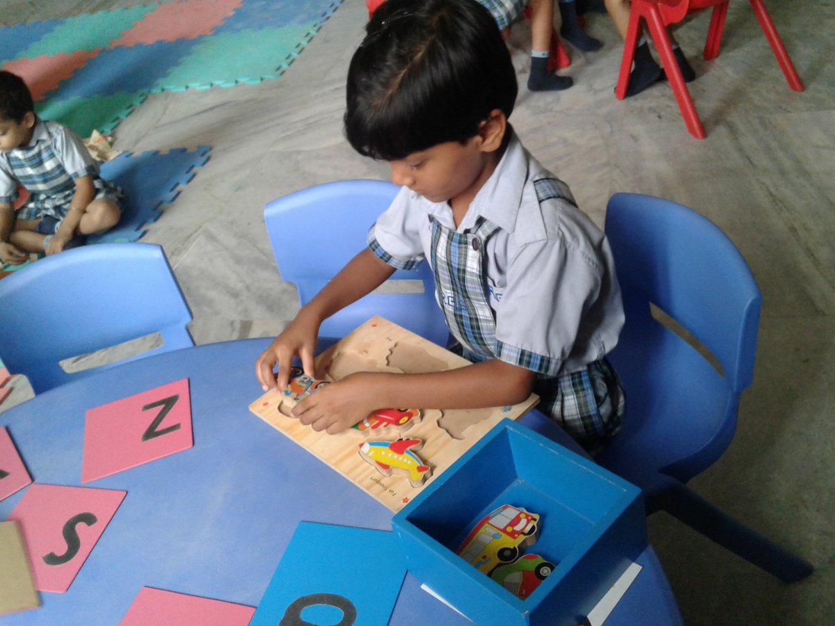 children are enjoying in the montessori lab with their puzzles #thinkingskills #problemsloving #cognitiveskill @supritichauhan @rgsnoida @SujataPurkayas3