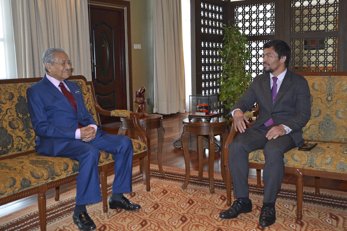 Meeting The Champ!

Tun Dr. M receiving Manny Pacquiao who is in Kuala Lumpur for the WBA welterweight championship. The title fight will be held at the Axiata Arena on this Sunday. Pacquiao will take on reigning champion Lucas Matthysse.