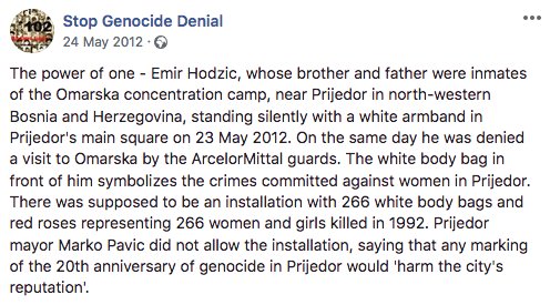 Emir Hodzic, whose brother & father were inmates of the Omarska concentration camp, was denied a visit to Omarska by the ArcelorMittal guards on 23 May 2012. The white body bag in front of him symbolizes the crimes committed against women in Prijedor.