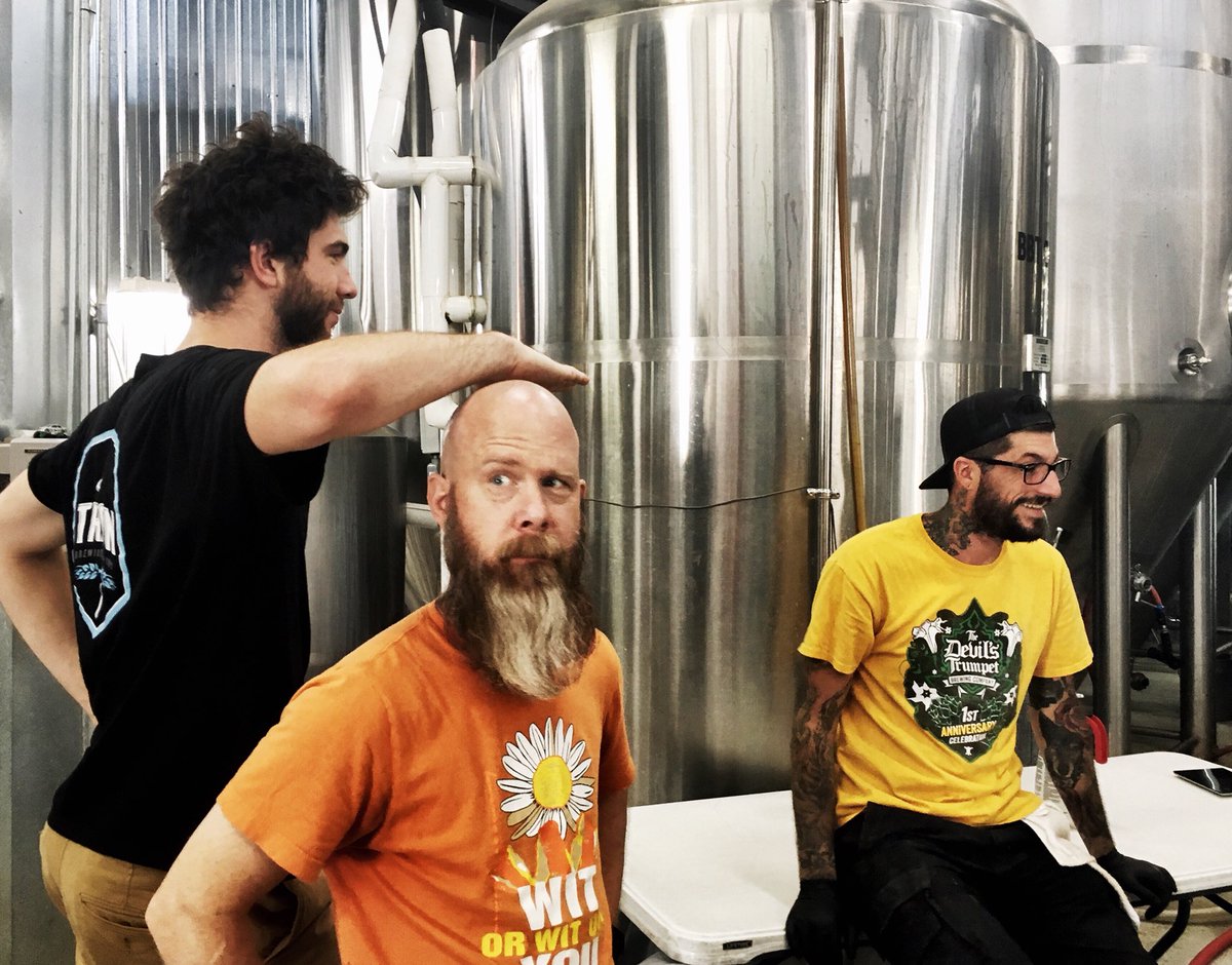 The moment you know you’re no longer just the @WabashCollege #SummerIntern - you’re part of the #TritonFamily ! #BehindTheScenes #BreweryLife @TritonBrewing @EvanFrank3 hanging with @brewerjon & @Tattoos_n_Brews prior to this morning’s packaging run.