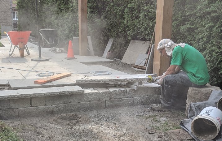 Remember the #Markham property needing aesthetic work around the pool? Here's a shot of some of the finishing stone work going in around the edges.

#landscapedesign #stonework