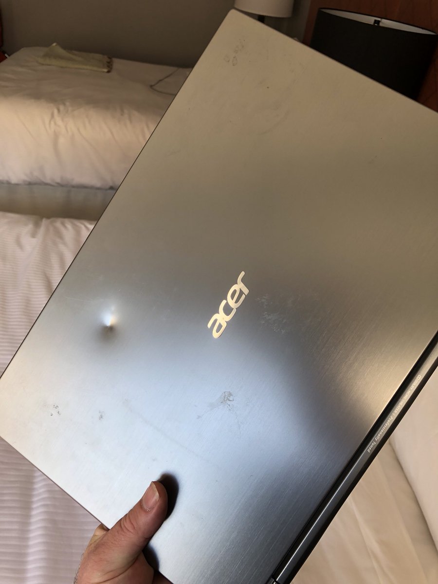 ShyWiseGuy's tweet photo. @Delta so I’m trying to file a damage claim but it says I need to go to the Baggage Office. I didn’t discover that my laptop was destroyed till I got to the hotel. Looks like someone took a hammer to it. The dent goes all the way through! https://t.co/sctWNERxSt