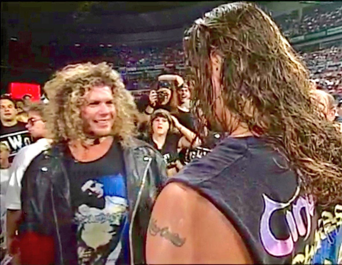 LuchaMax's tweet photo. Since the #ShirtsofRaven project has gotten some eyeballs, need help on this one, 90’s band t-shirt experts. https://t.co/ib20QKeW7k