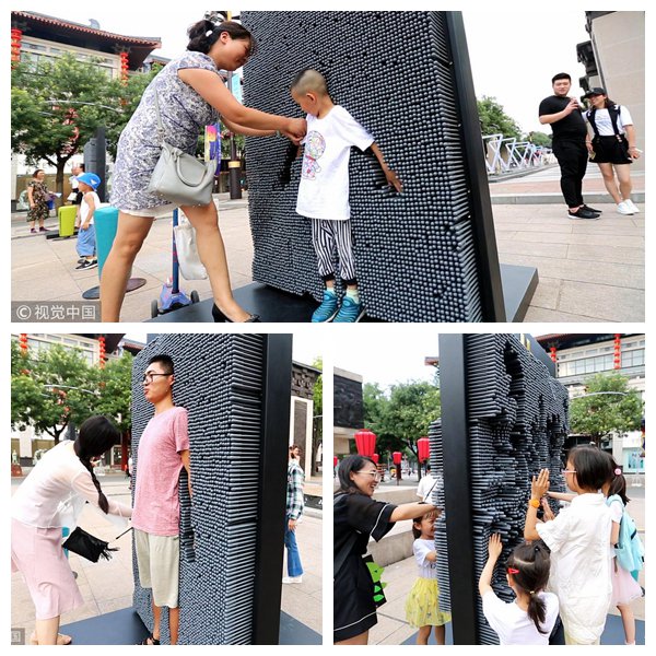#ICYMI A gadget said to “3D-print” human bodies attracts curious bystanders on a street in Xi’an City in northwest China’s Shanxi Province