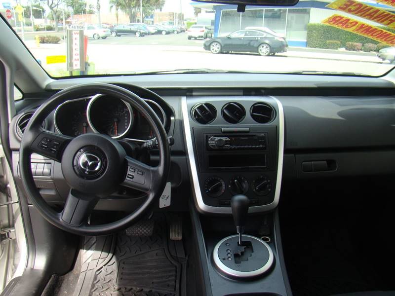 AutoMasterGrou1's tweet image. 2008 Mazda CX-7 Sport 4dr SUV / $6,495 / 100,388 Miles 
If you're the type who prefers a sport coupe to a station wagon, the 2008 Mazda CX-7's roomy rear seat, optional all-wheel drive and seductive good looks present a workable compromise.