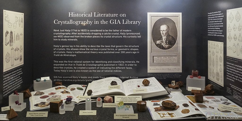 Stop by the @SDFair in #DelMar now through July 4 to see our educational exhibit showcasing the 'Historical Literature on Crystallography in the GIA Library.' The case includes gem mineral specimens, faceted #gems, antique wooden crystal models and books. #DelMarFair