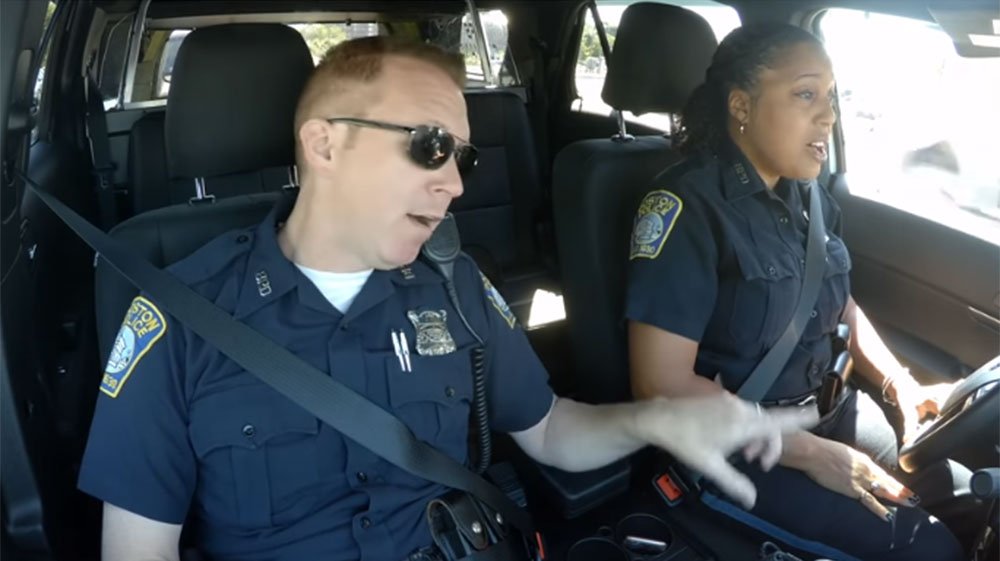 BostonGlobe's tweet image. Two members of the Boston Police Department’s media relations team climbed into a cruiser — and started singing a duet of “God Bless America.” bos.gl/e2mBbIK