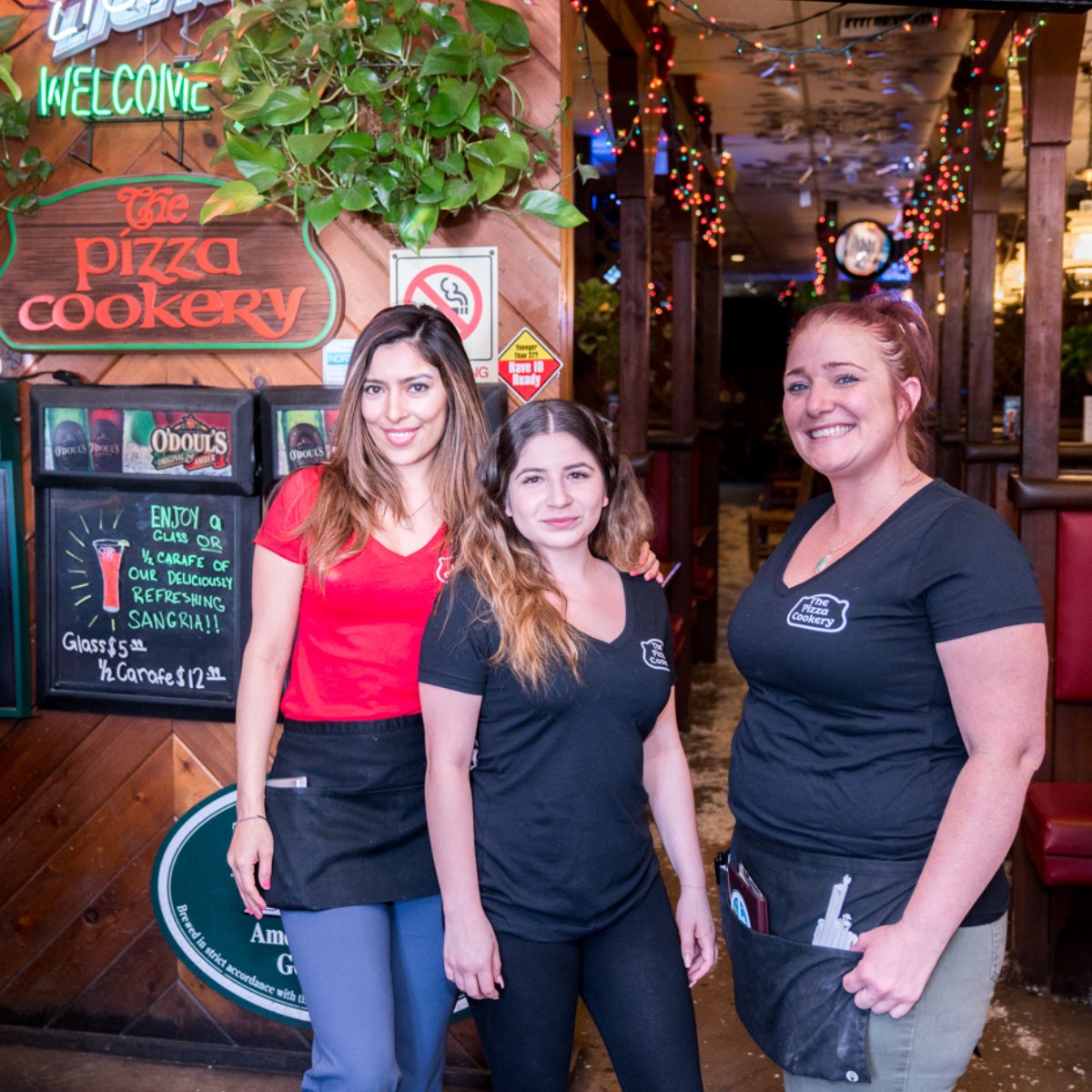 The crew that always serves up pizza with a smile.