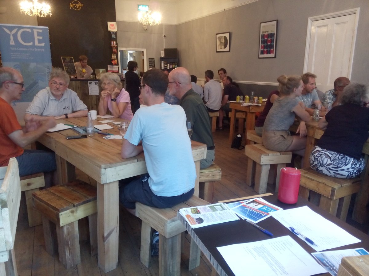 Groups deep in discussion on energy efficiency, retrofit, sustainable building & #communityenergy - our Energy Café for #CommunityEnergyFortnight #cef18