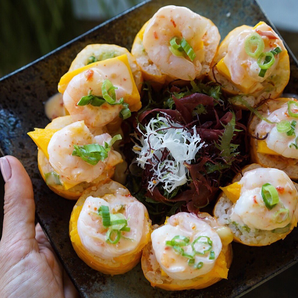 RoninSushi's tweet photo. Put some mango on it ✨ 
For July: Spicy tuna + crab mix + cucumber + avocado + tempura crunch topped w/ sliced mango + shrimp + sweet chili sauce.  #features #maki https://t.co/pZnlgwHsdG