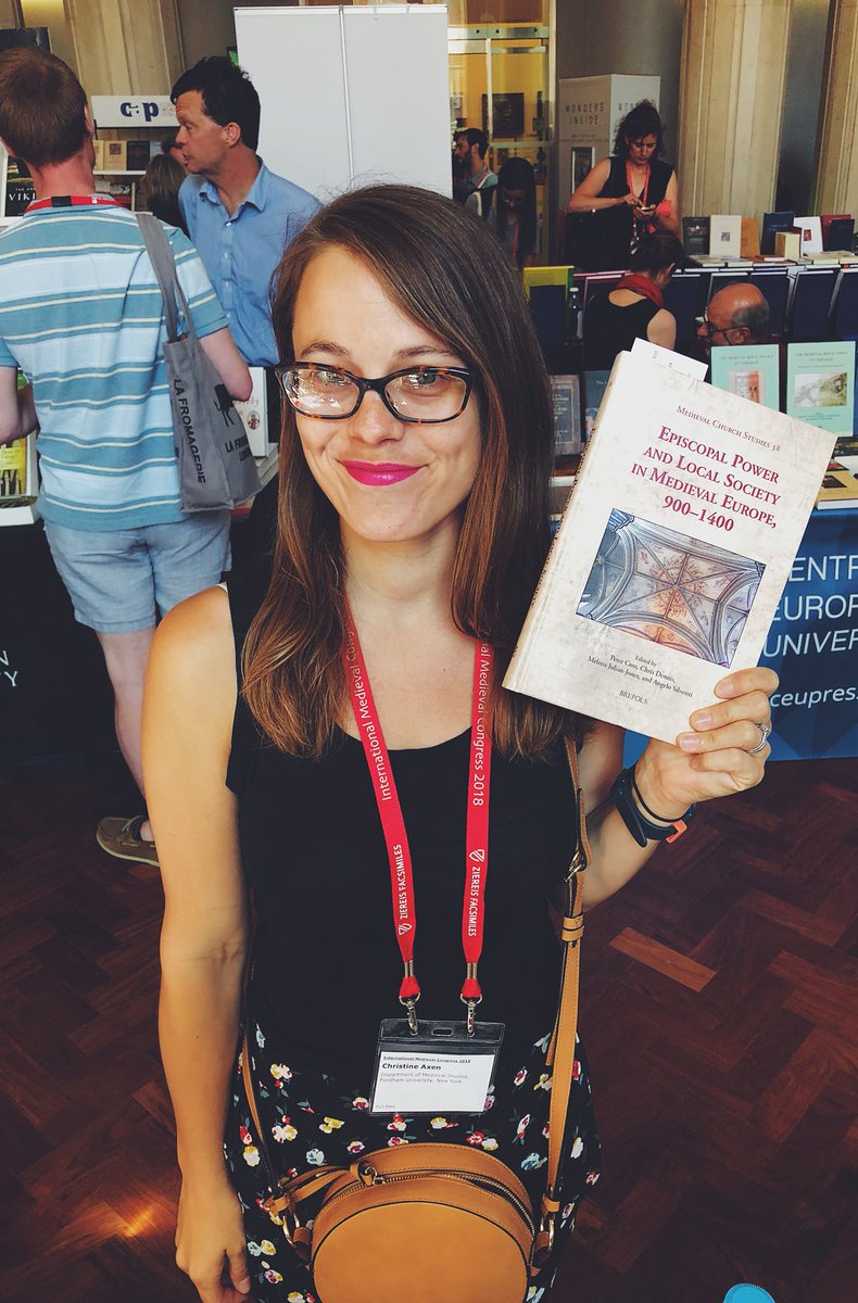 Brepols's tweet photo. At #IMC2018, @ChristineAxen was happy to find a copy of ‘Episcopal Power and Local Society in Medieval Europe’ with her article in it on the bishop Zoen of Avignon! #Congrats @EPISCOPUSorg https://t.co/IZDc3ekRU6