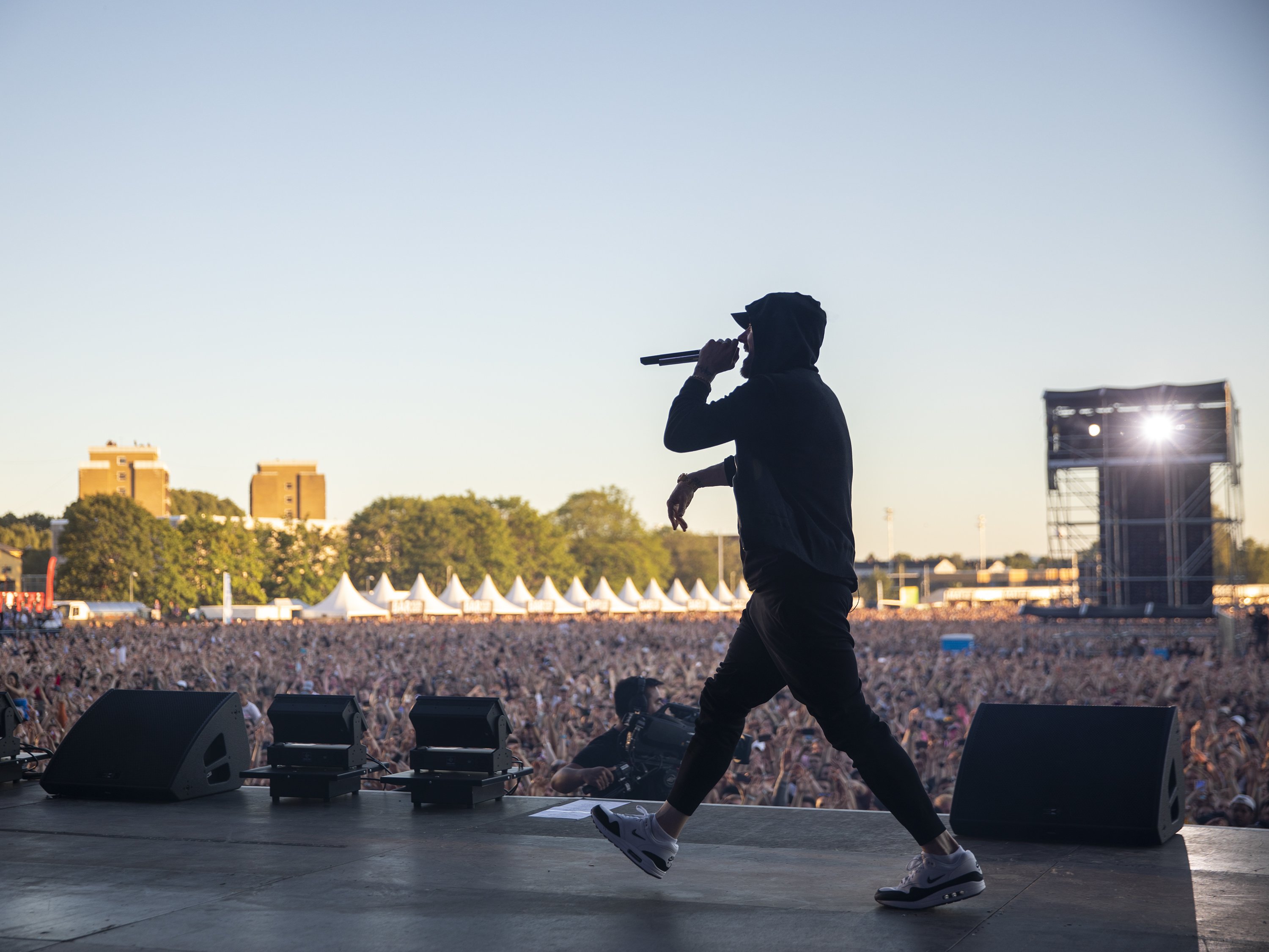 Eminem framing face with hands