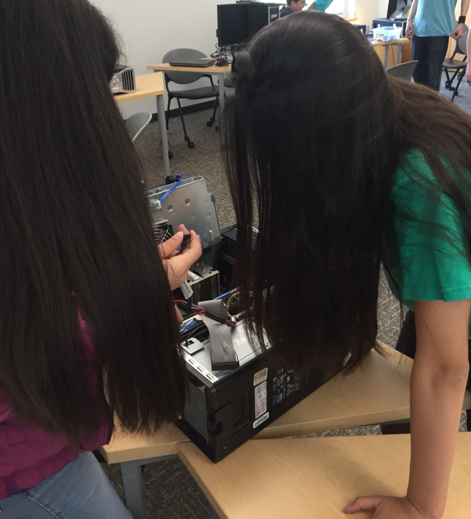 SCInformalSTEM's tweet photo. The @SienaCollegeSTEM Camps have started! Taking the @FLOSSDesktops computers apart the first time. Some are still putting them back together, some are starting to wipe the disks with DBAN.  Working through the #MAKE lessons. Love the hair in the computer! https://t.co/7oKhe4jT46