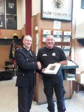 DubFireBrigade's tweet photo. This weekend we said goodbye to Mick Mulligan as he retires from Phibsborough fire station. A/3rd Officer Paul O'Reilly made a presentation to Mick in the presence of his colleagues on D Watch. Thanks Mick, you'll be missed 👋🏼 🚒🚑 https://t.co/ydLFfGQARw