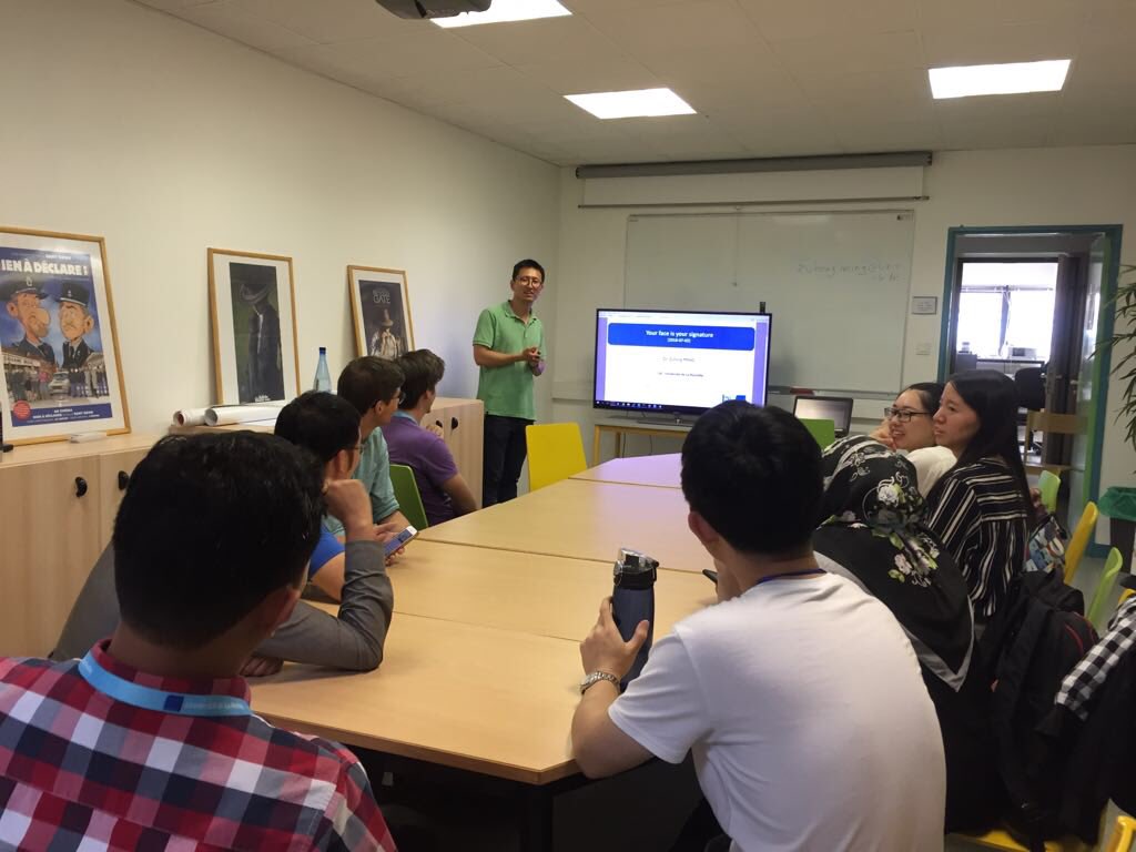 ssda2018's tweet photo. Dr. Zuheng presenting his work on face detection, face recognition and face verification. #ssda2018 @L3i_LaRochelle @UnivLaRochelle @IAPR_TC11 @IAPR_TC10 https://t.co/6TJdTVSK7c