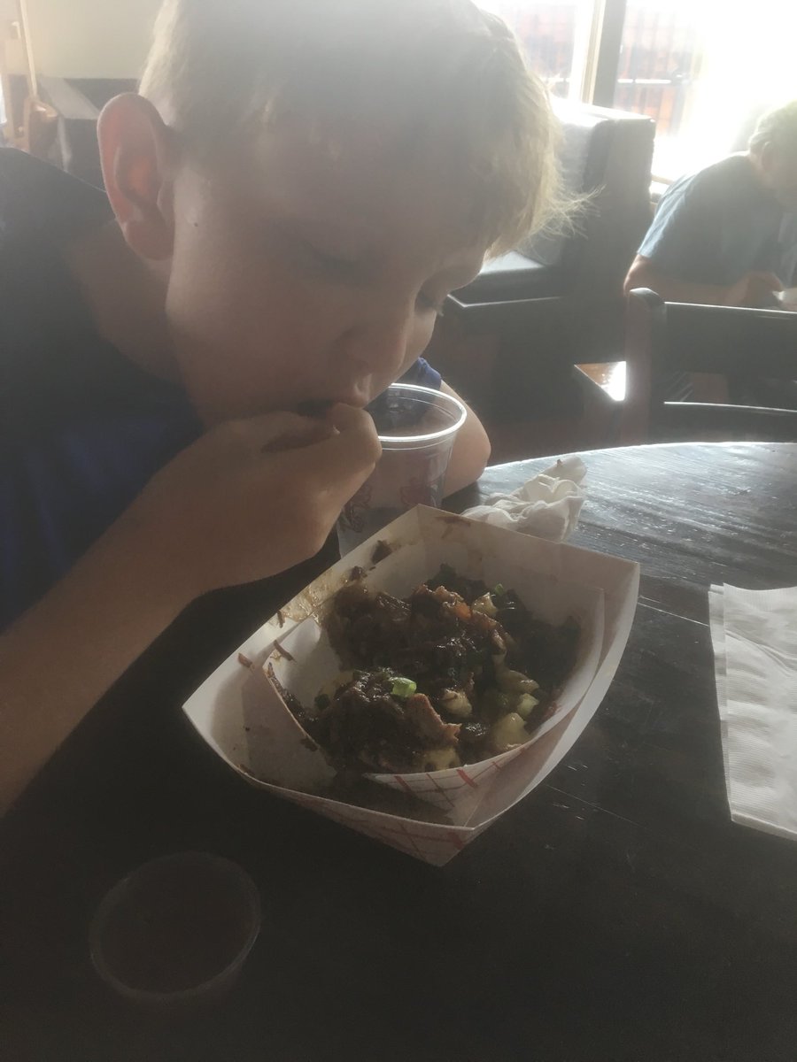 HogDatNation's tweet image. The piglet is trying his best to get through the brisket poutine ⁦@McClureBarbecue⁩