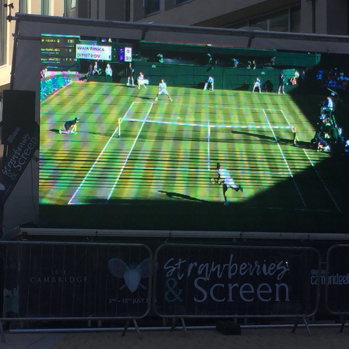 Screen up outside <a href="/The_Tamburlaine/">The Tamburlaine</a> near the station tennis on for next two weeks