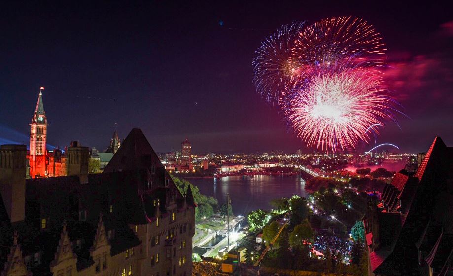 Canada's tweet image. As fireworks lit up the Canadian skies last night, #CanadaDay once again reminded us of why we love this great country. Our welcoming spirit makes us proud to belong! #Canada151 📷 @jpeltzer @JMcKayPhotoWhig @Neil_Zee
