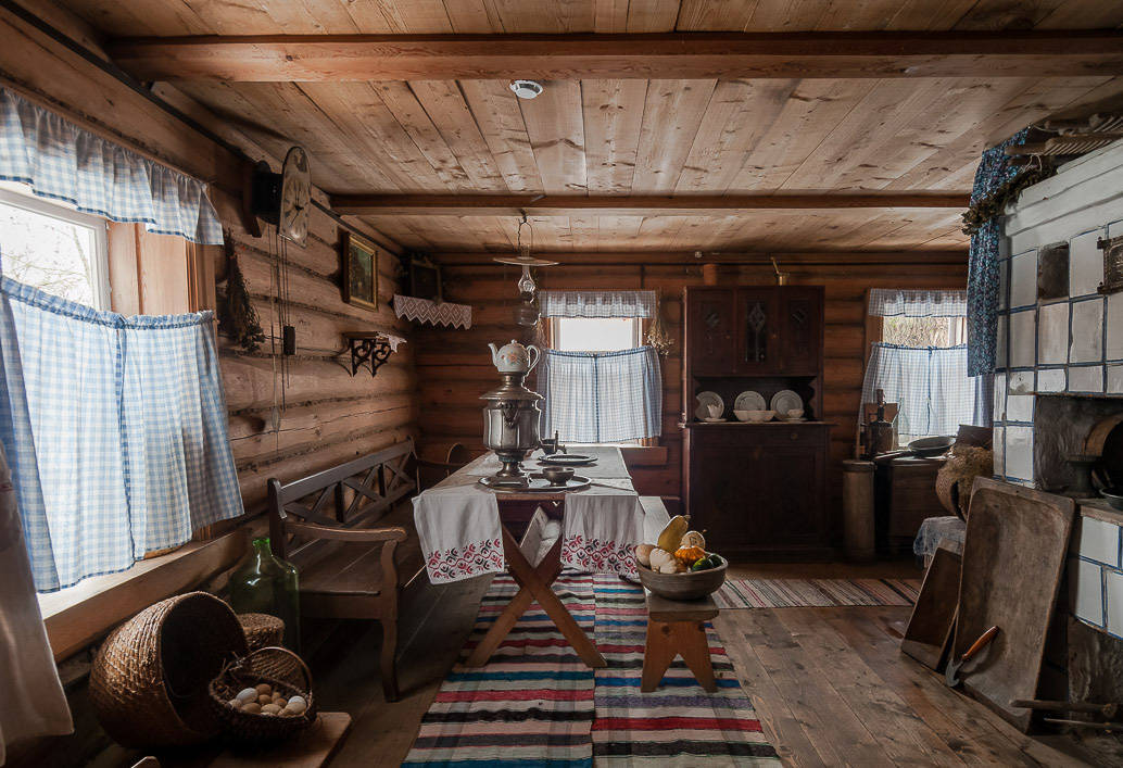 Conversely, in colder climates, lower ceilings meant higher temperatures. Here are log houses from Russia and Sweden. The efficiently constructed fireplace created an interior draught that sucked fresh air in and expelled smoke, dust. Fans or mechanical ventilation not needed.