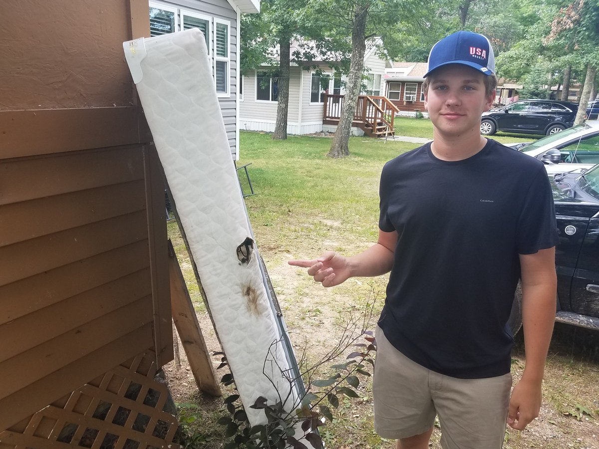 Jeff_Wagner4's tweet photo. Corey Wilmer points to the spot where his bed caught fire after lightning struck the roof of the bunkhouse where he was laying, sending a charge through the walls. the box spring, and him! Check out the spiderweb-like burn he got. Story at 10 on @WCCO. https://t.co/myIYlX0zM4
