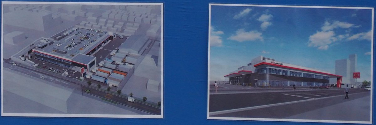 1010d 料番p 建替工事中の愛媛日野自動車本社に貼り出されている完成イメージ