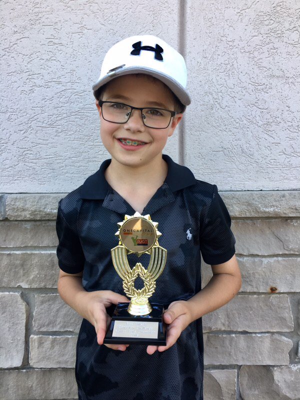 BradFritsch's tweet photo. Forgot to do this a couple days ago...but these two junior golfers made @MattRobinsonPGA send me their pics with their @playjrgolftour trophies. Congrats Joey and Sanvi, you’re both awesome! https://t.co/e9spO9pwkP