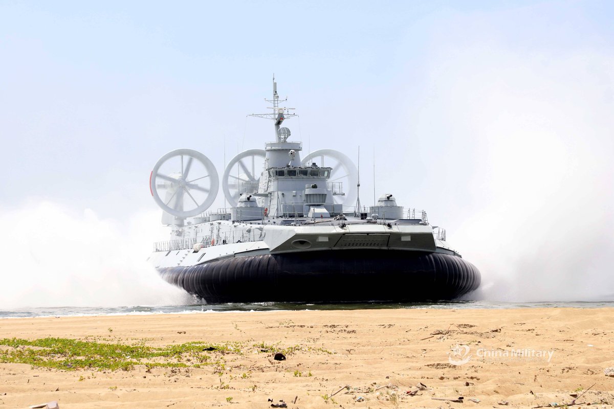 CavasShips's tweet photo. Nice pics of #Chinese #Navy #Zubr-class Project 1232.2 air-cushion landing craft 3327 maneuvering on a beach and embarking armored vehicles on June 30 &amp; July 1. Soviet-designed Zubrs are world's largest #LCACs. Note the trash on the beach. https://t.co/9AuIy1YHJv https://t.co/XYueh08xJm