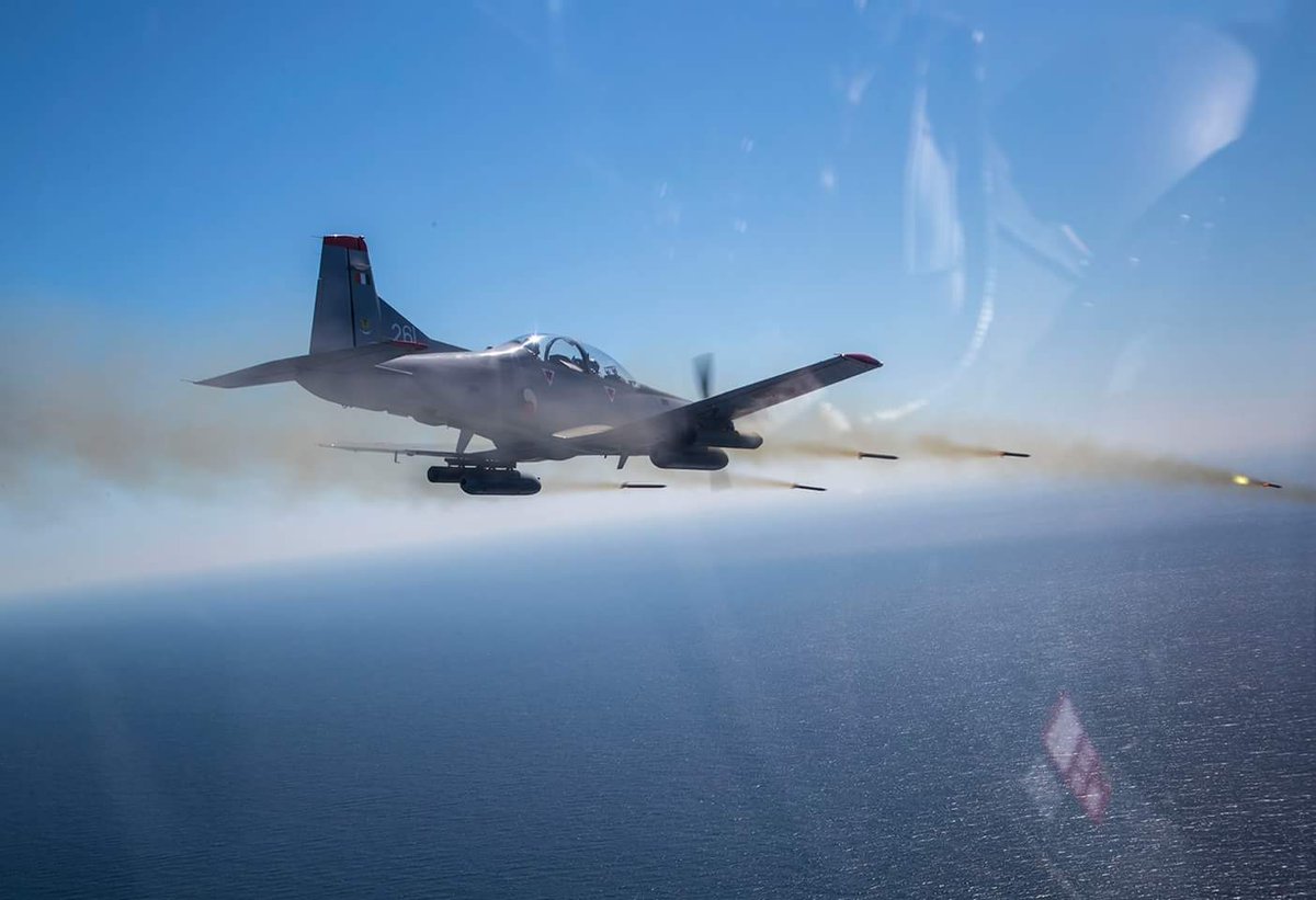 IrishAirCorps's tweet photo. You can run...but you can't hide! Pictured below is one of our PC-9M's firing it's cache of 2.75inch rockets during Ex Lámh Foisteanach off the Cork coast. #strengthenthenation #defendprotectsupport #joinourteam #pilatus https://t.co/RL3dE3nnV0