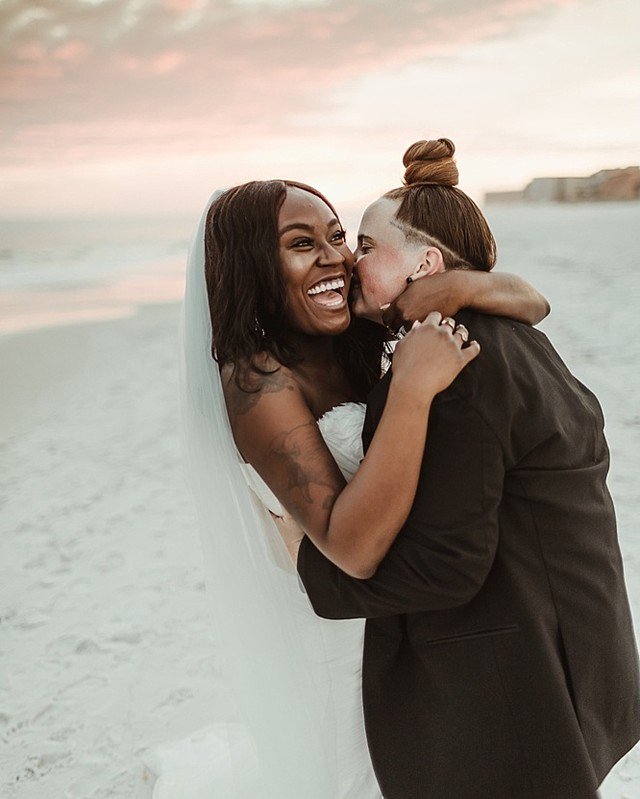 Smiles as wide as the ocean from these brides, now featured on @loveincmag! Their elegant black tie beach wedding and spectacular sunset portrait sesh were submitted by @nabazabihphotography.
.
Photography: @nabazabihphotography | Venue: @fivestarproperties | Dress Store: @vocell